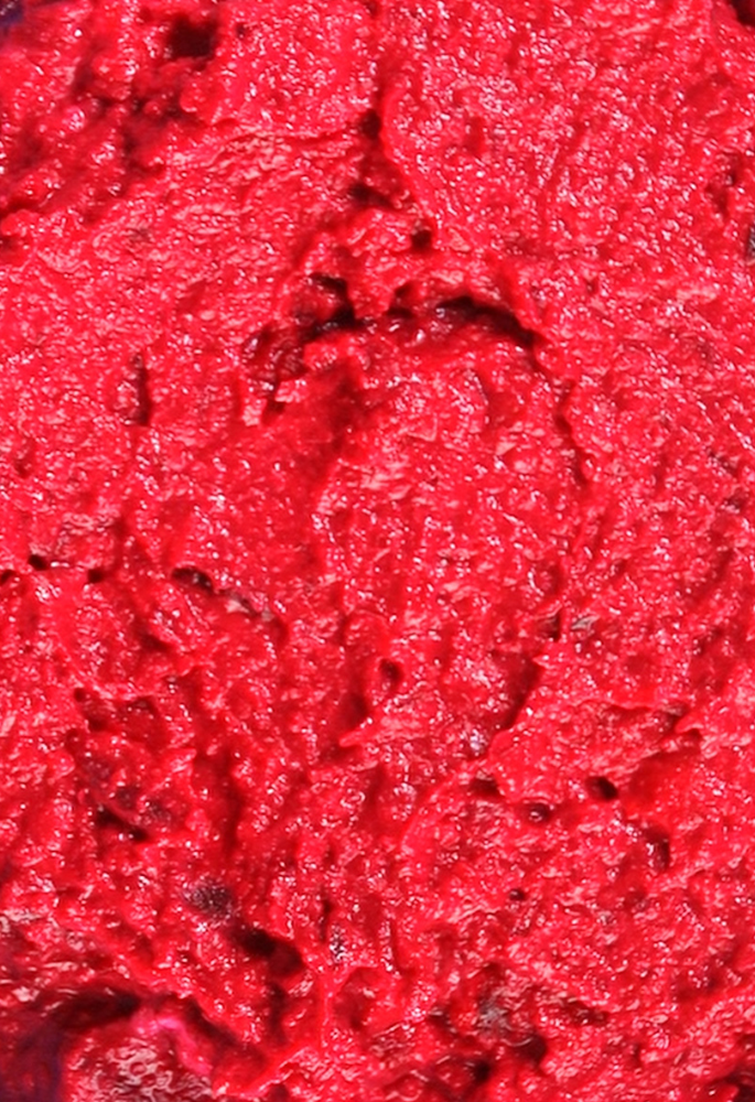 Close up of beetroot hummus, bright pink