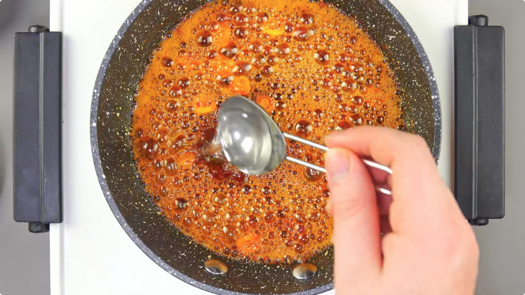 Loosening sauce with a splash of water
